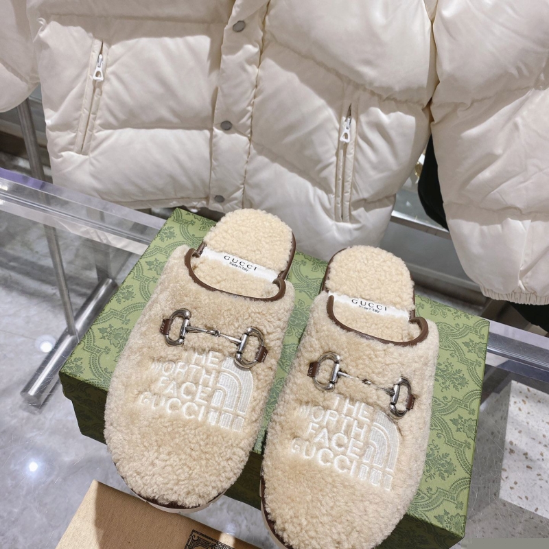 G*u*i slippers
